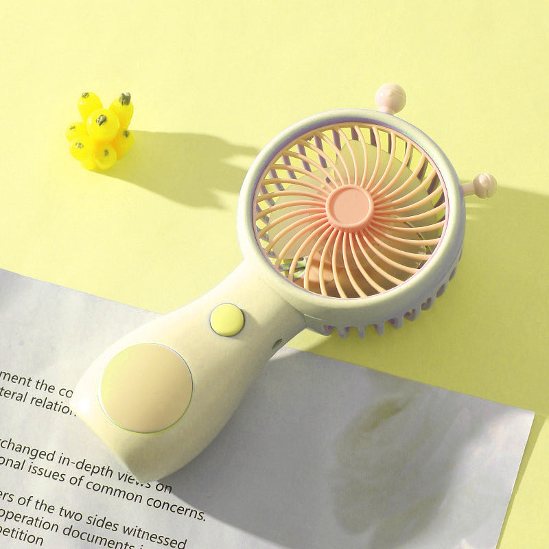 Cute Mini Handheld Fan – Portable Summer Fan for Kids, Travel & Daily Cooling